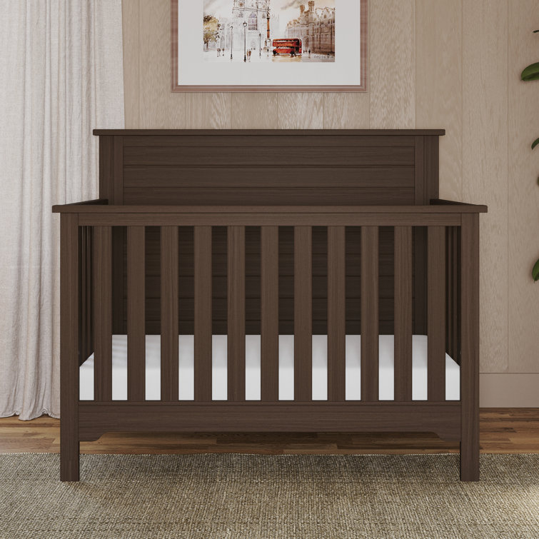 Dark brown crib hot sale with changing table